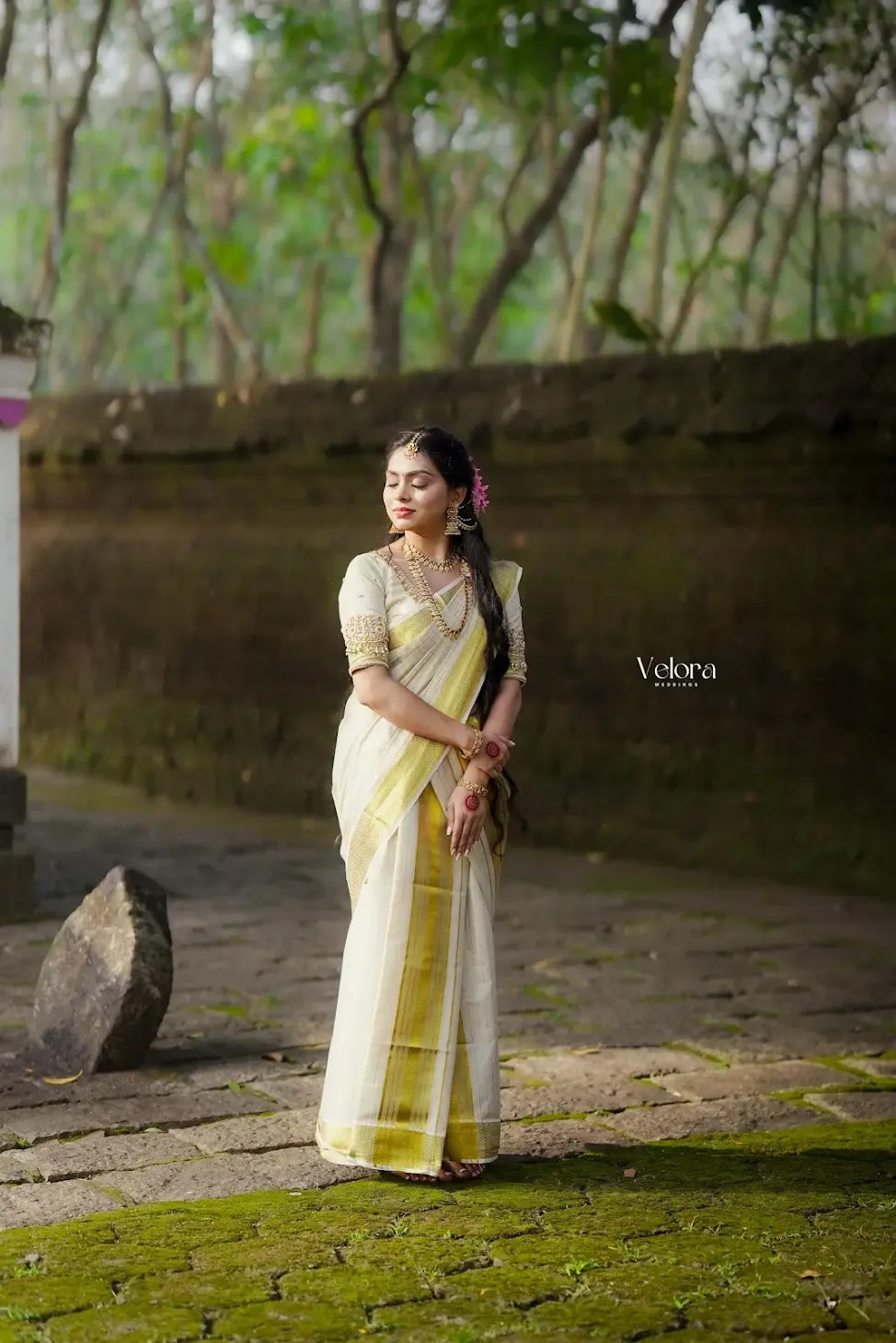 Beautiful saree draping by Jinu in Guruvayur